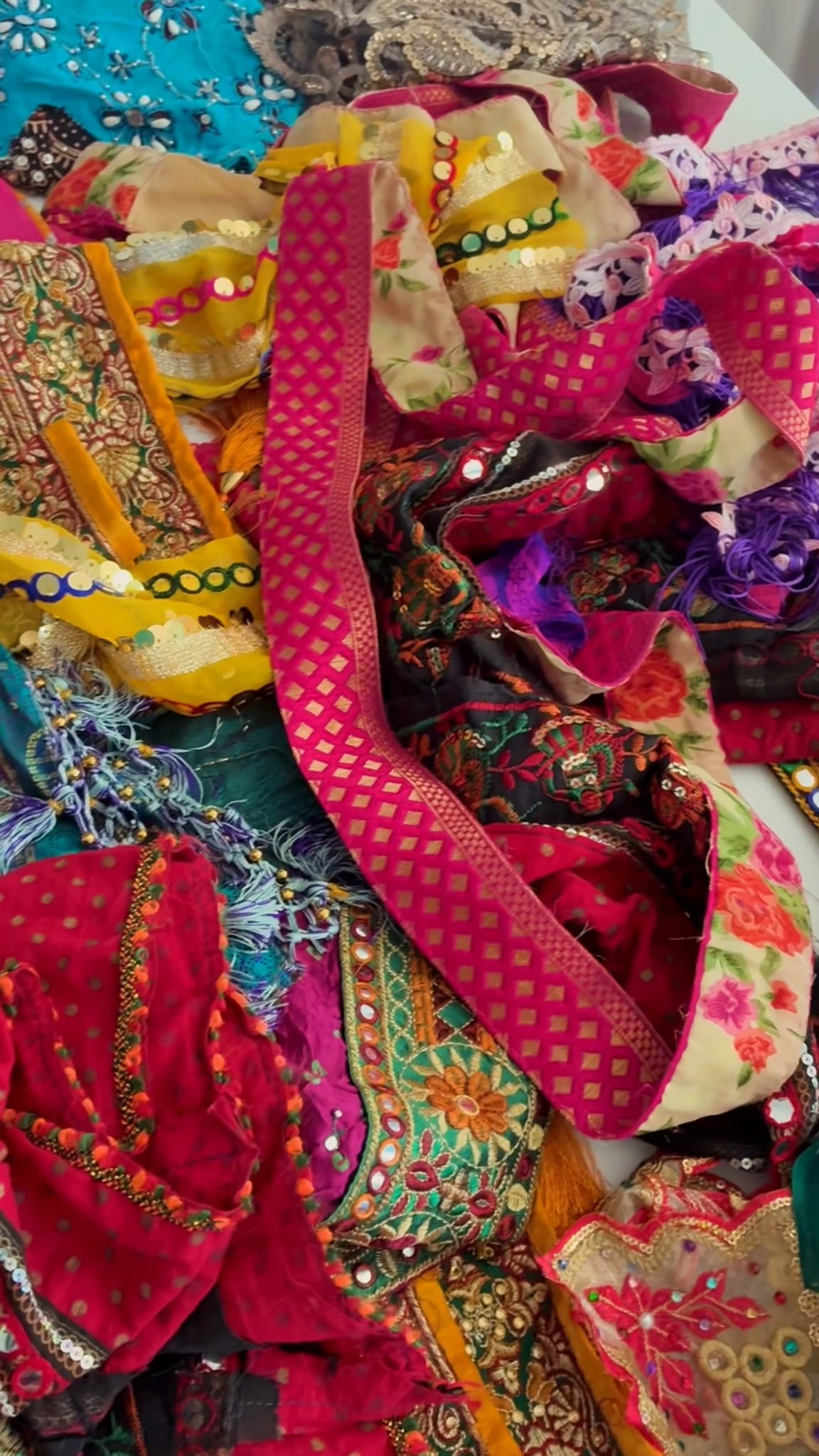What are we making?! You'll find out at Manchester Day on Sunday 26th July 👀 . Sneaky peek behind the scenes of the fabric elements, working with @rkm_mangoarts, using donated sari fabric. A new exciting comission for @global_grooves. 

#Carnival #UKCarnival #Textiles #cabasacic #UKTextiles